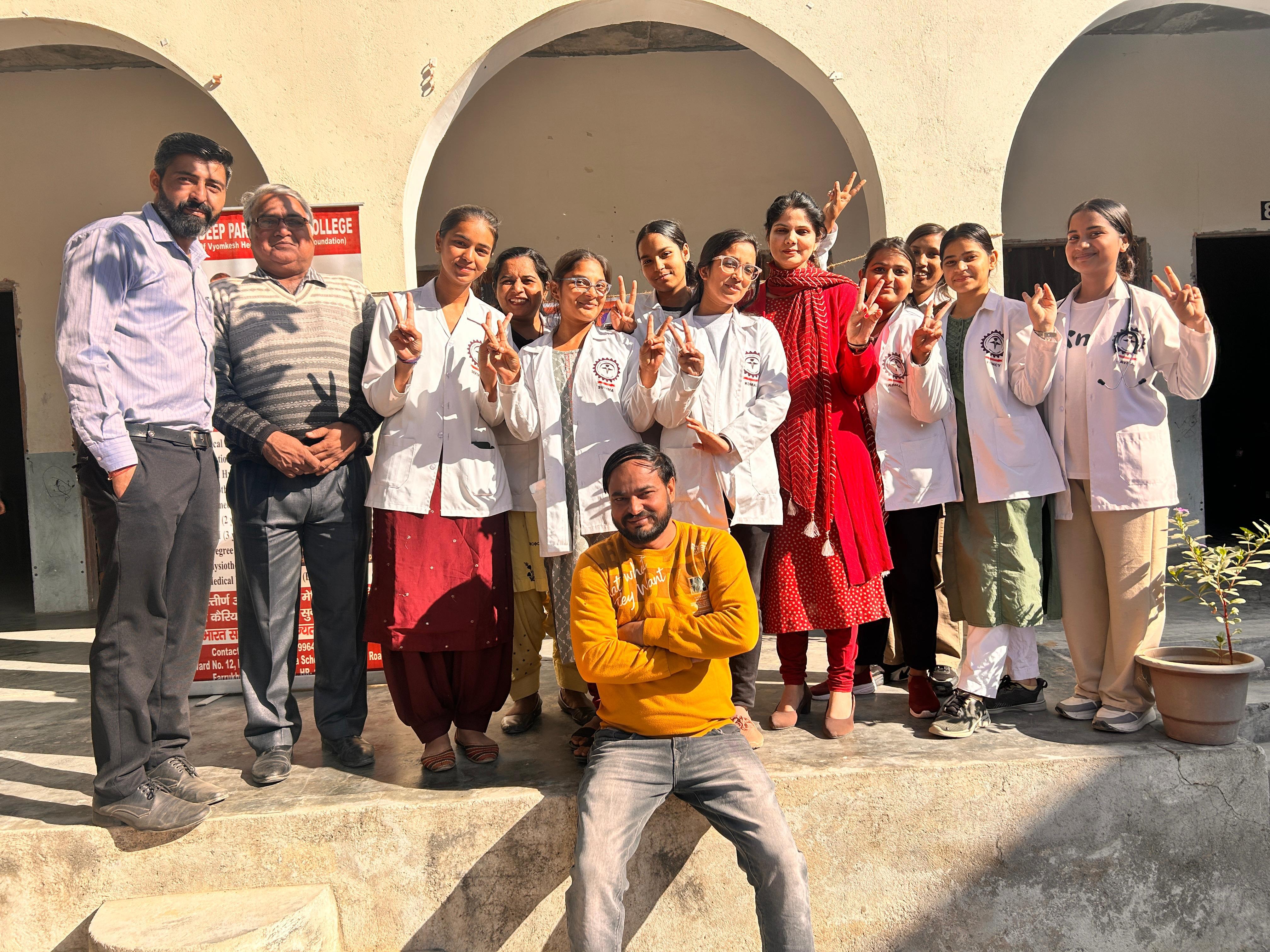 Students and teachers in a professional academic setting